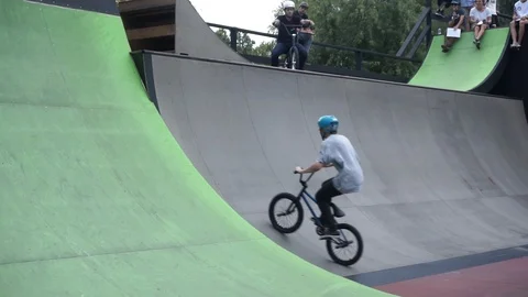 Cyclist makes a flip on the springboard and rides further Video stock 103217403
