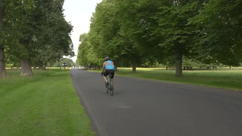 Cyclist in park Stock Footage 137449343