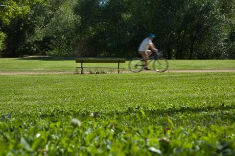 Cyclist in a park Stock Photos