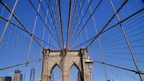 Cyclist Passing and Crowd Walking on Brooklyn Bridge, New York City Video stock 116604431