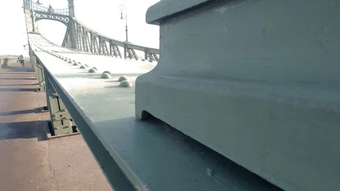 Cyclist passing by in Liberty Bridge in Budapest, Hungary Stock Footage 127210285