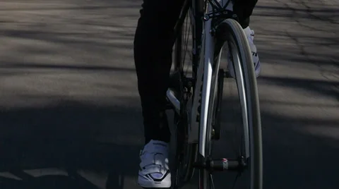 Cyclist pedaling slowly Stock Footage 32324149