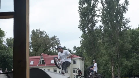 Cyclist performs a stunt in the air after jump Stock-Footage 103220536