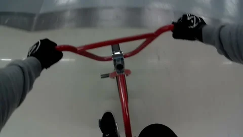 Cyclist performs tricks in training area 스톡 동영상 102117802