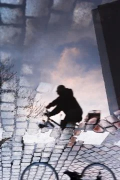 Cyclist reflection bottom up Stock Photos