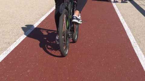 Cyclist rides along the cycle path on the bridge in the afternoon. Bicycle path  Видео 108777423