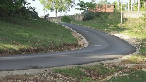 A cyclist rides down the road at speed. Stock Footage 137212702