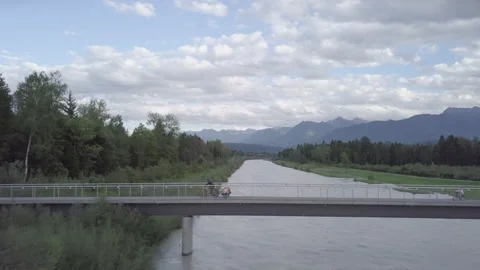 Cyclist Rides Over The Bridge Stock Footage 264044184