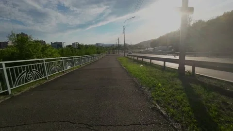 Cyclist rides on a path Video stock 204937221