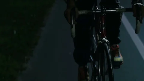 Cyclist riding a bicycle close-up Stock Footage 76497247