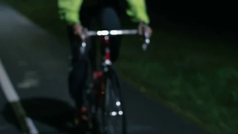 Cyclist riding a bicycle close-up Video stock 76497412