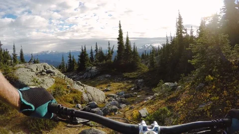 Cyclist Riding Bike On Top Of A Big Mountain Stock-Footage 116783353