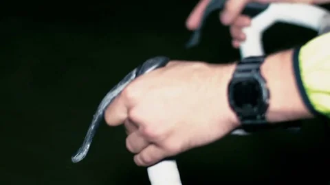 Cyclist riding at night close-up Stock Footage 76496460