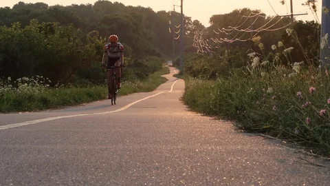 Cyclist Riding in Sunset Video stock 108509056
