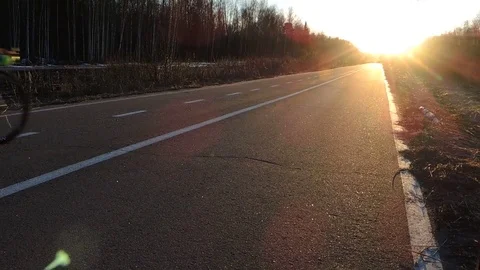 Cyclist on a road Stock Footage 74959636