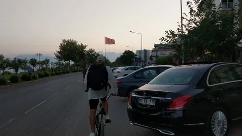 Cyclist on the road 스톡 동영상 92761607