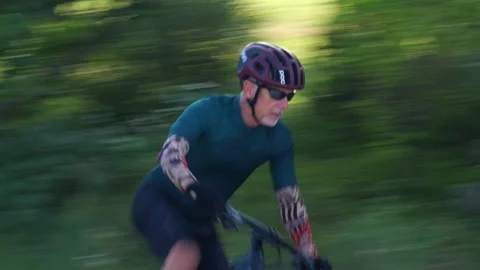 Cyclist Rounds Trail Backlit 15 Fps Stock Footage 203308532