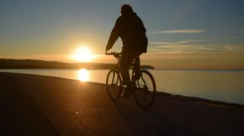 Cyclist silhouette on sunset Stock-Footage 60232617