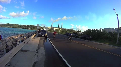 Cyclist smiling, riding sunset. Stock Footage 44755498