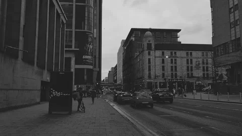 A cyclist standing on the sidewalk checking his phone Stock Footage 171836036
