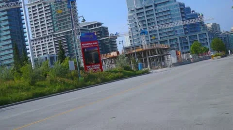 Cyclist Through New Condo Construction Project Stock Footage 11520656