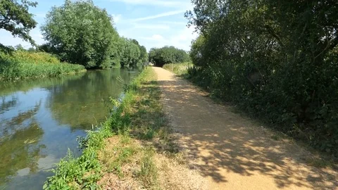 Cyclist on tow path 00012 Stock Footage 91871483
