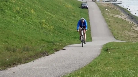 Cyclist training on the mountain road Stock Footage 82068712