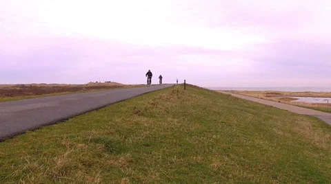 Cyclists and runner on the bike path. Stock Footage 34367660