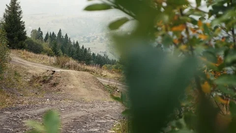 Cyclists are jumping from the springboard Stock Footage 117178878