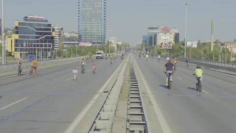Cyclists are participating in a bicycle procession along a boulevard in Sofia 動画素材 346375432