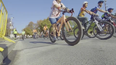 Cyclists are riding in a bicycle procession along a boulevard in Sofia Stock Footage 346375488