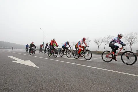 Cyclists are trying to move forward,on a Road cycling competition site. Stock Photos