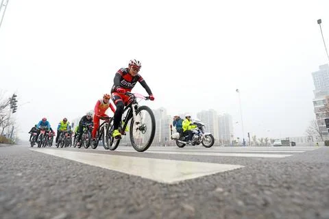Cyclists are trying to move forward,on a Road cycling competition site. Stock Photos