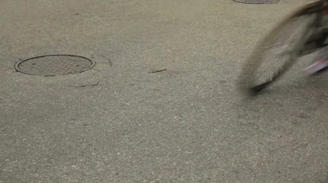 Cyclists blurring past camera  Stock Footage 8655403