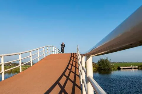 Cyclists on Bridge Groot-Ammers Stock Photos