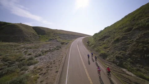Cyclists Climb Hill Drone Stock Footage 172250459