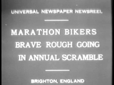 Cyclists compete in a rough all terrain race in Brighton, England, with a Stock Footage 75768286