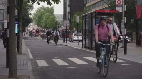 Cyclists on a cycle path in London, England Stock Footage 147142581