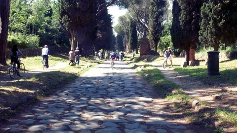 Cyclists cycling on the ancient Appia Stock Footage 90133204