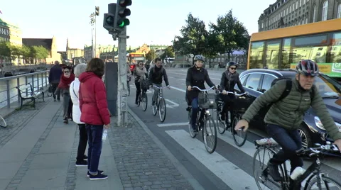Cyclists Cycling down Main Road near Christiansborg Palace 스톡 동영상 68597426