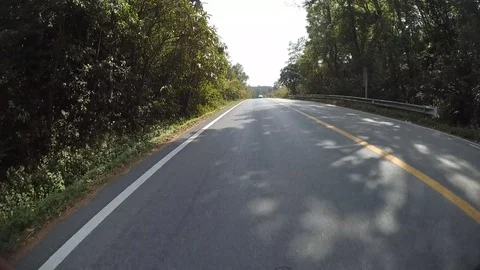 Cyclists down the hill at high speed. Stockbeeldmateriaal 85829961