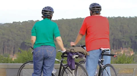 Cyclists enjoying view Stock Footage 974396