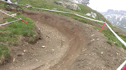 Cyclists going downhill Stock Footage 33061590