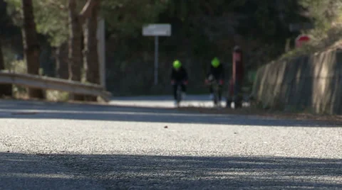 Cyclists going uphill Stock Footage 37321866