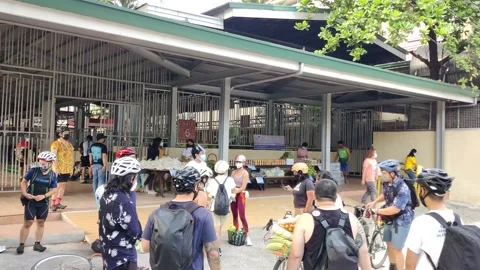 Cyclists help out at Community Pantry 動画素材 154596808