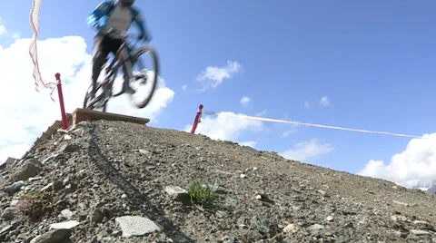 Cyclists jumping from bridge Stock Footage 33061478