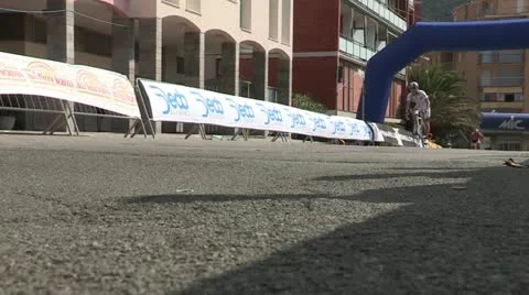 Cyclists leisurely course down the road Stock Footage 22204487