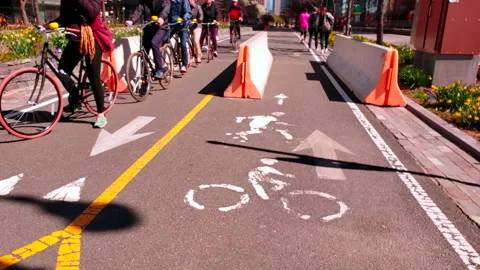 Cyclists in lower manhattan.4K Stock Footage 135618269