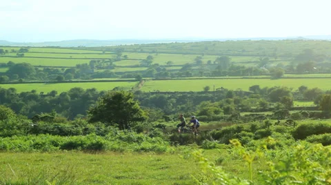 Cyclists on the moor 스톡 동영상 39852505