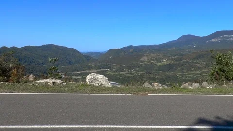 Cyclists on mountain road Stock Footage 70847442